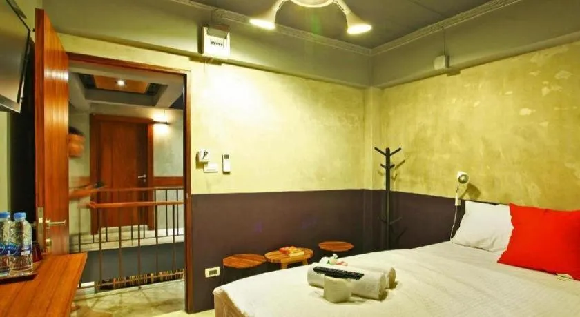 Bed in Chic Chiangkhan Hotel