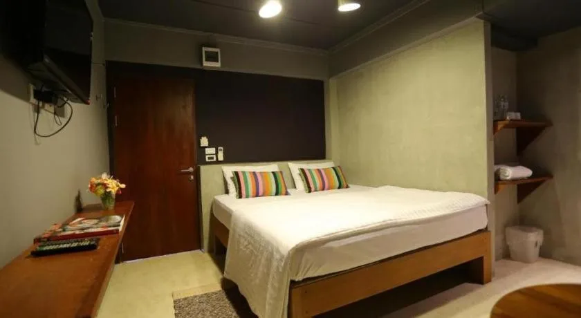 Bed in Chic Chiangkhan Hotel