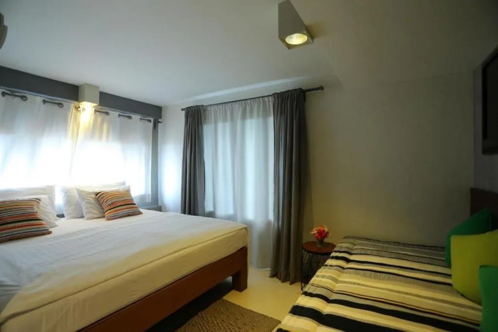 Bed in Chic Chiangkhan Hotel