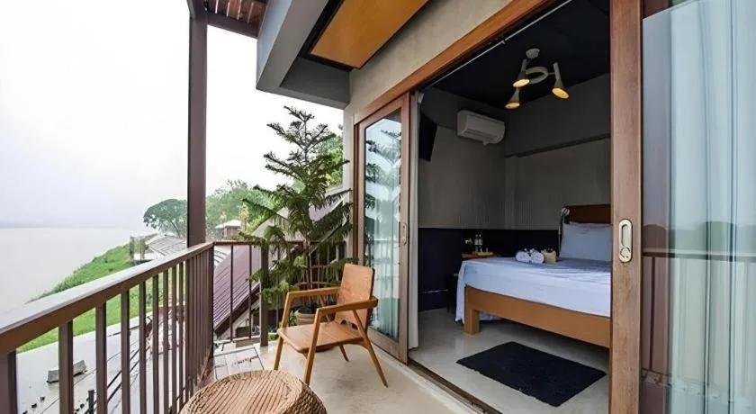 Bed in Chic Chiangkhan Hotel