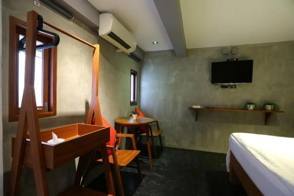 Bed in Chic Chiangkhan Hotel