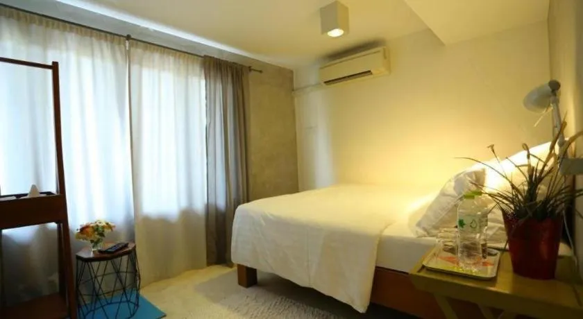 Bed in Chic Chiangkhan Hotel