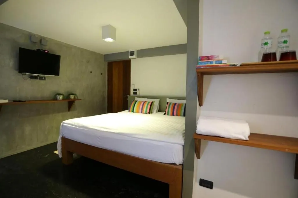 Bed in Chic Chiangkhan Hotel