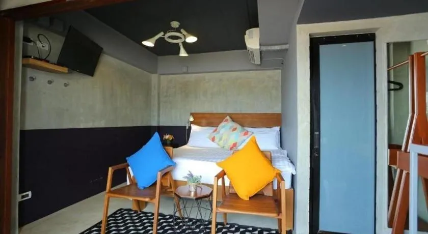 Bed in Chic Chiangkhan Hotel