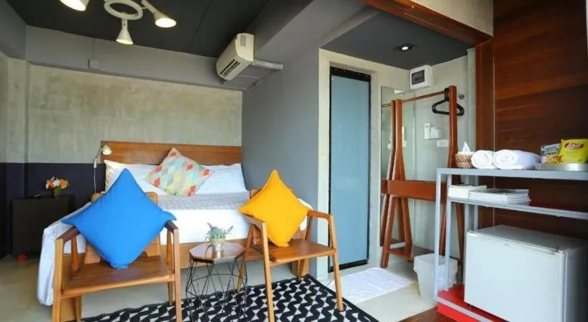 Bed in Chic Chiangkhan Hotel