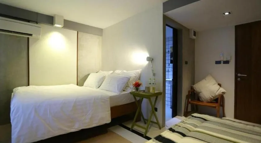 Bed in Chic Chiangkhan Hotel