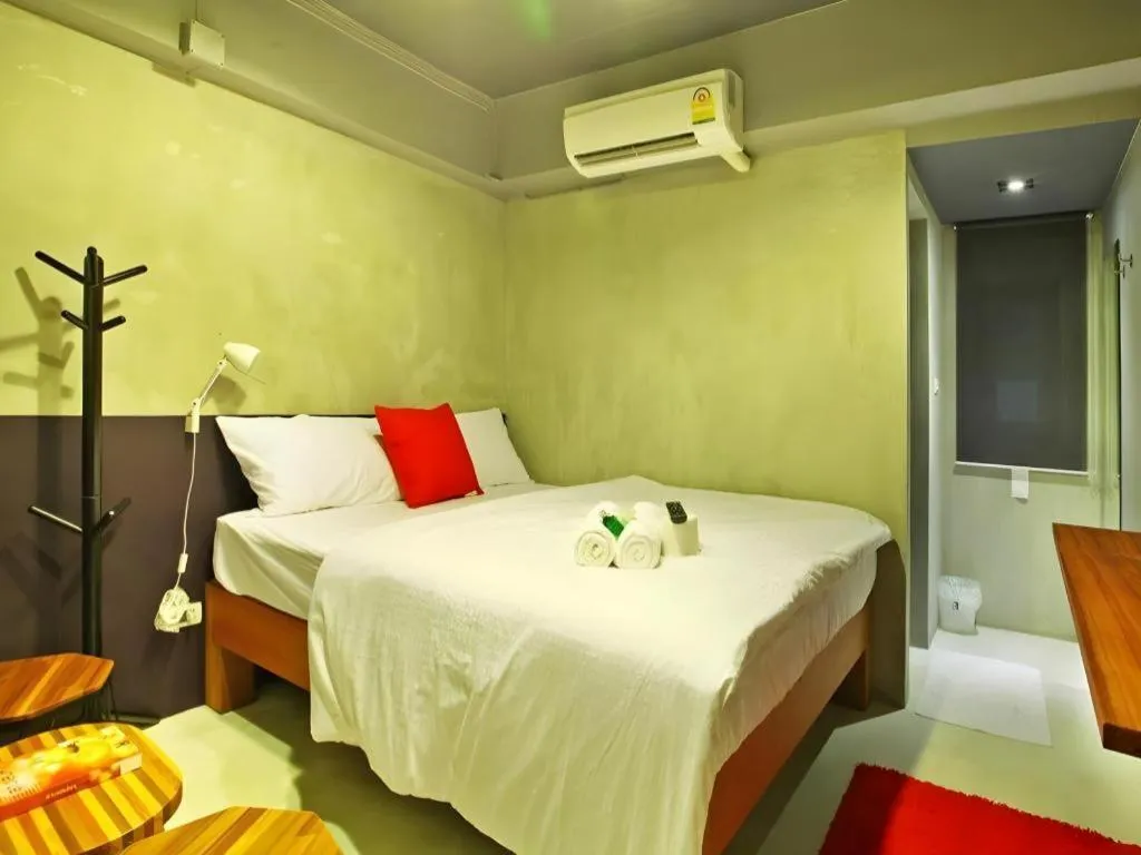 Bed in Chic Chiangkhan Hotel