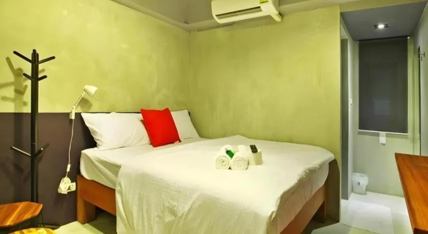 Bed in Chic Chiangkhan Hotel