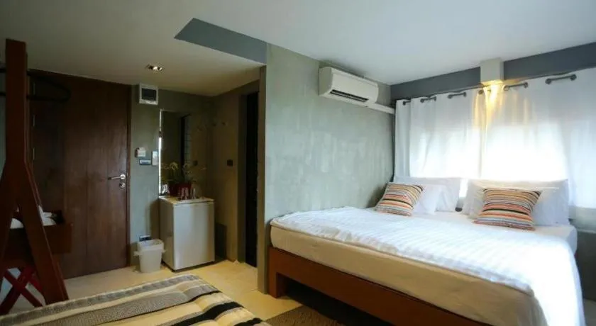 Bed in Chic Chiangkhan Hotel