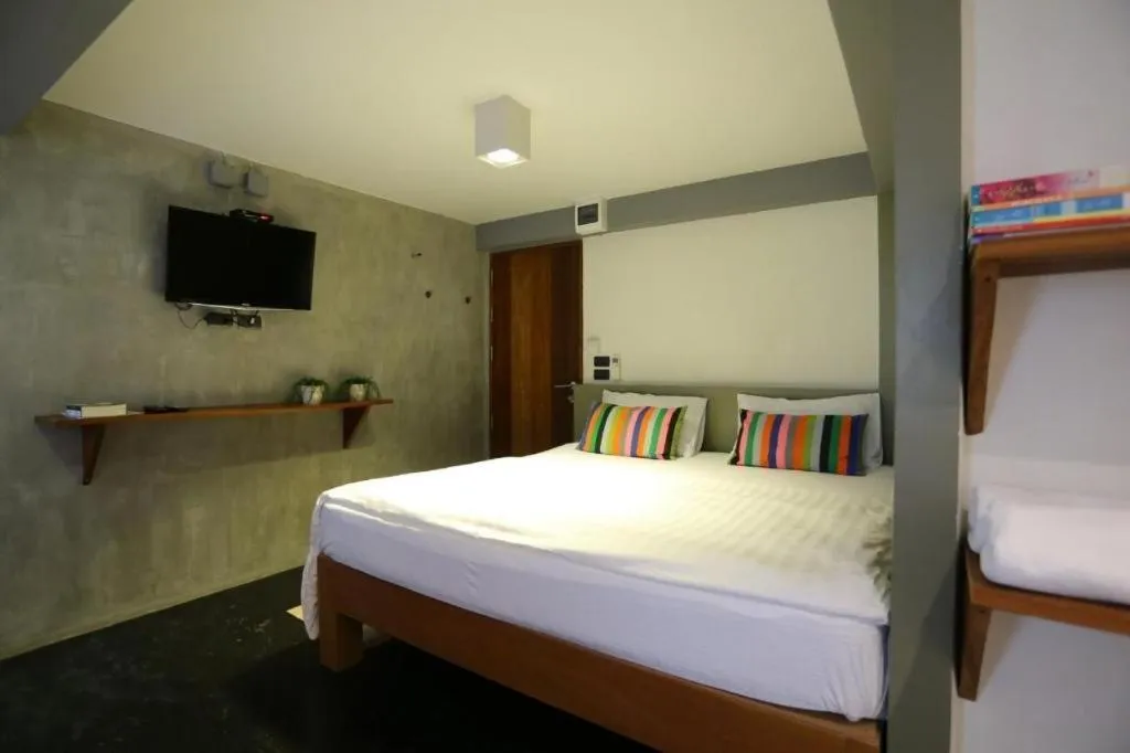 Bed in Chic Chiangkhan Hotel