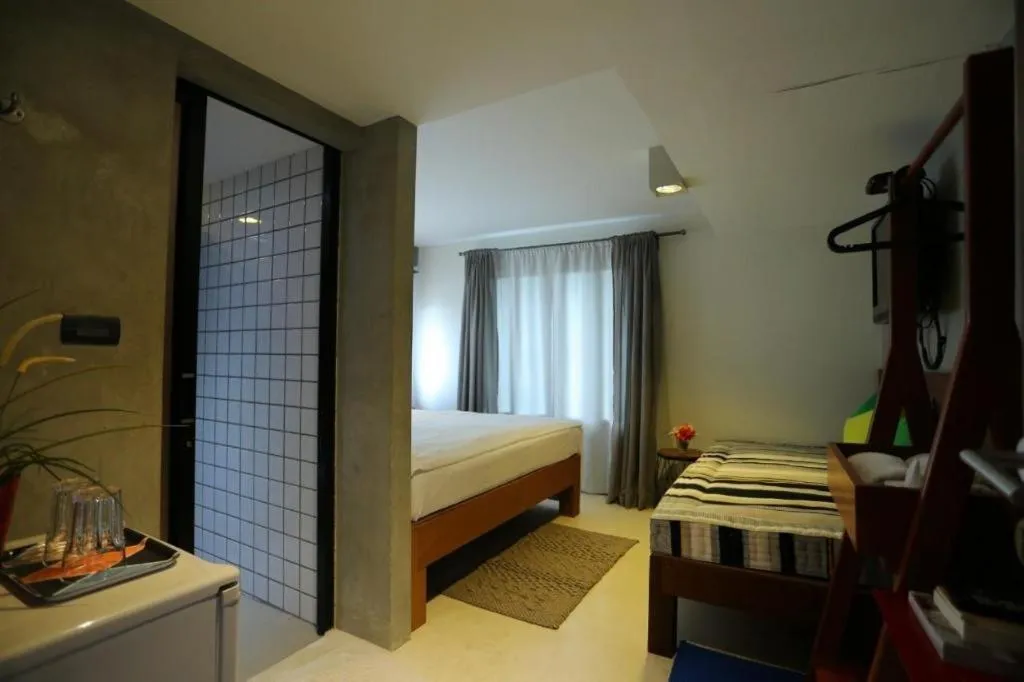 Bed in Chic Chiangkhan Hotel