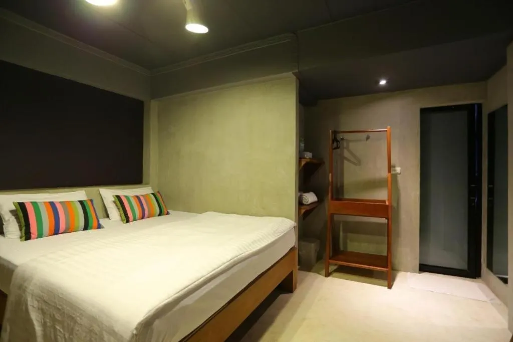 Bed in Chic Chiangkhan Hotel