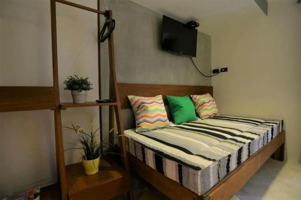 Bed in Chic Chiangkhan Hotel