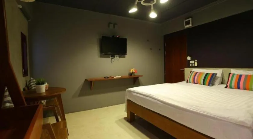 Bed in Chic Chiangkhan Hotel