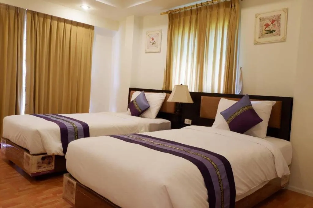 Bed in Sida Resort Hotel Nakhon Nayok