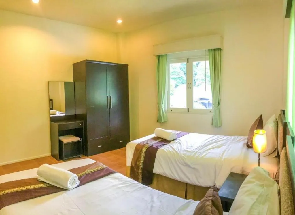 Bed in Sida Resort Hotel Nakhon Nayok