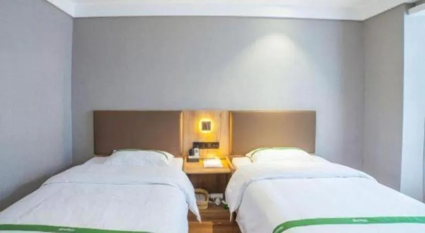 Bed in GreenTree Inn Hefei Chenghuangmiao San Xiao Kou Subway Station Hotel