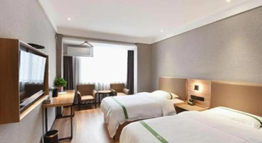 Bed in GreenTree Inn Hefei Chenghuangmiao San Xiao Kou Subway Station Hotel