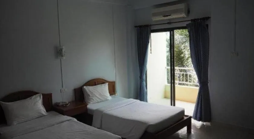 Bed in Ritzy House Hotel