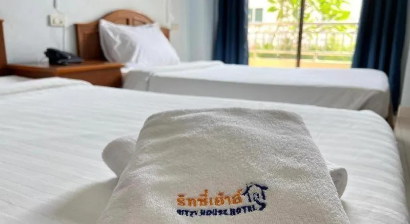 Bed in Ritzy House Hotel