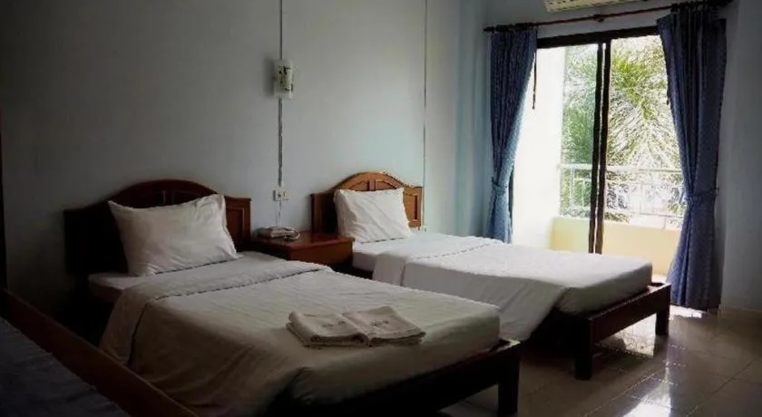 Bed in Ritzy House Hotel