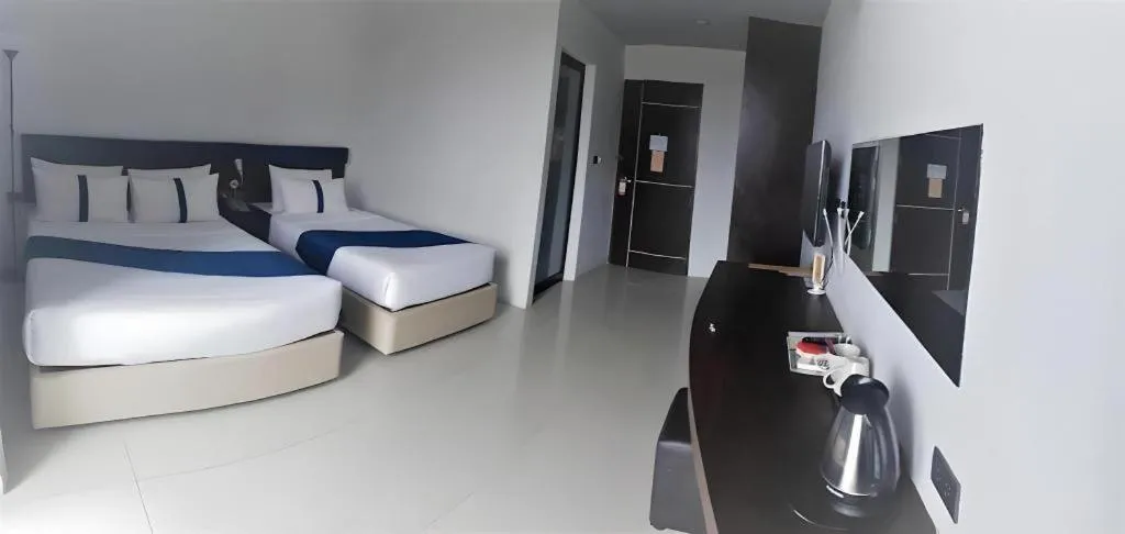 Bed in Ingtara Hotel