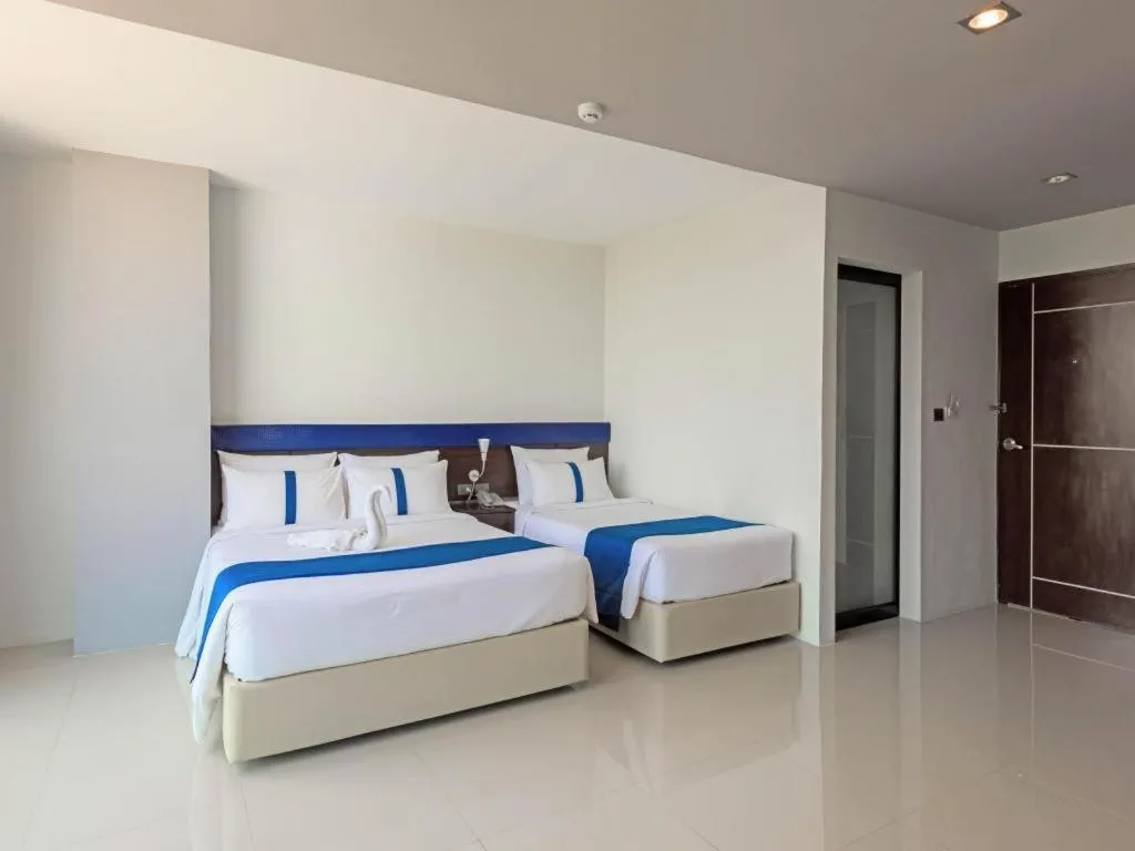 Bed in Ingtara Hotel