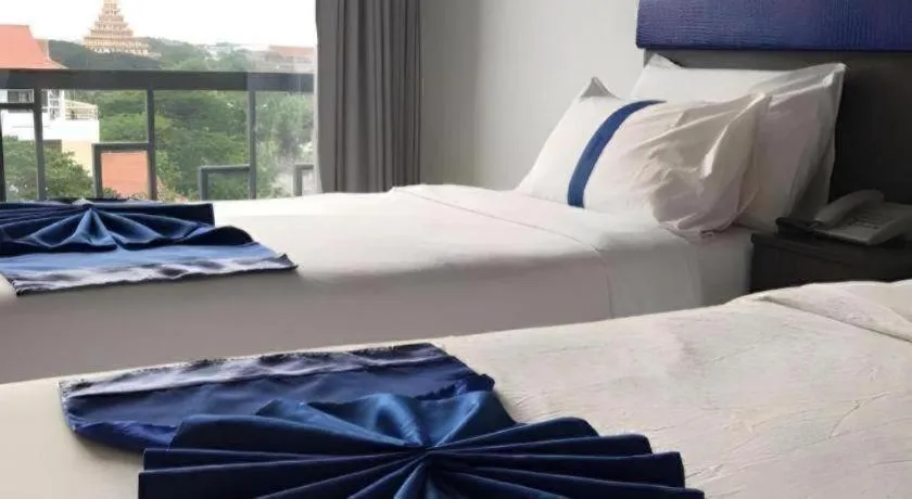 Bed in Ingtara Hotel