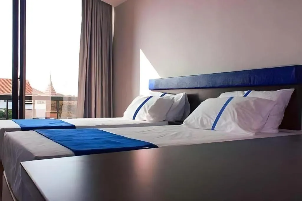 Bed in Ingtara Hotel