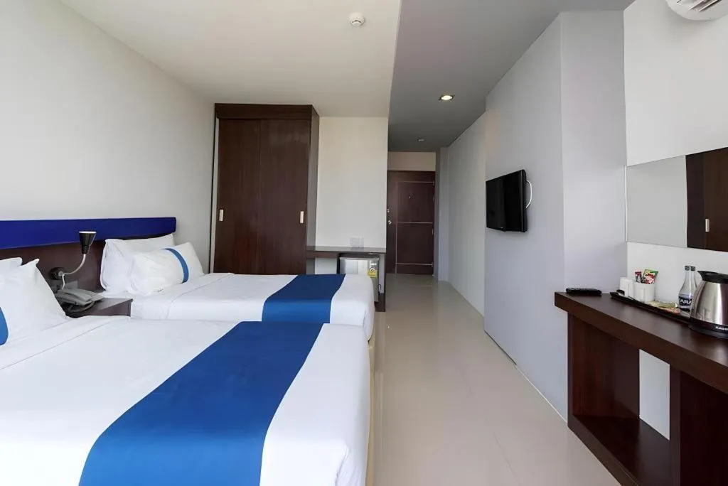 Bed in Ingtara Hotel