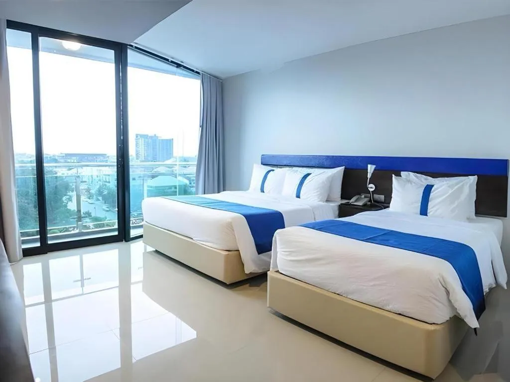 Bed in Ingtara Hotel