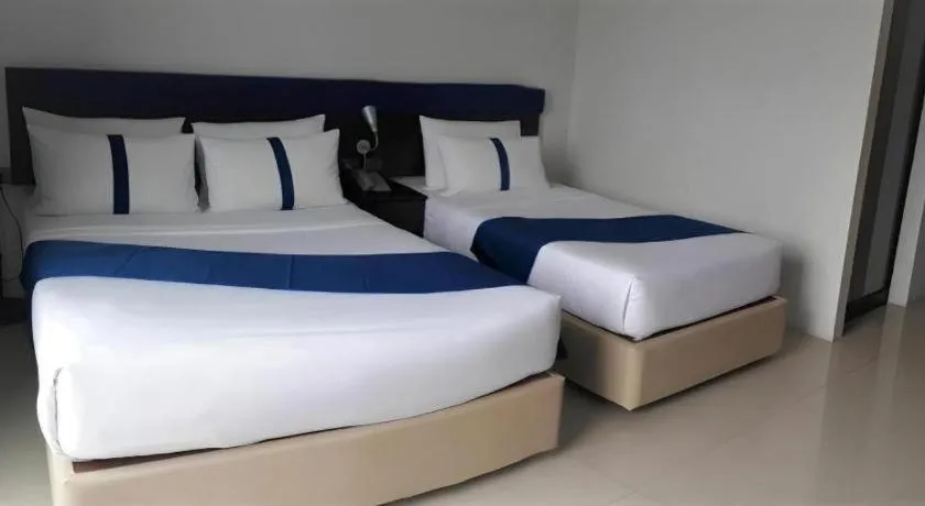 Bed in Ingtara Hotel