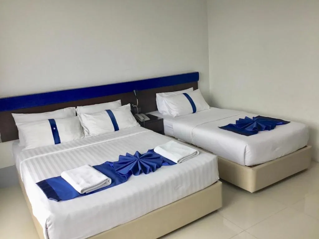 Bed in Ingtara Hotel