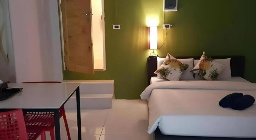 Bed in The Color Express Hotel