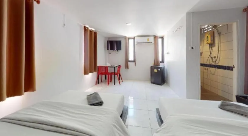 Bed in The Color Express Hotel