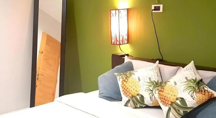 Bed in The Color Express Hotel