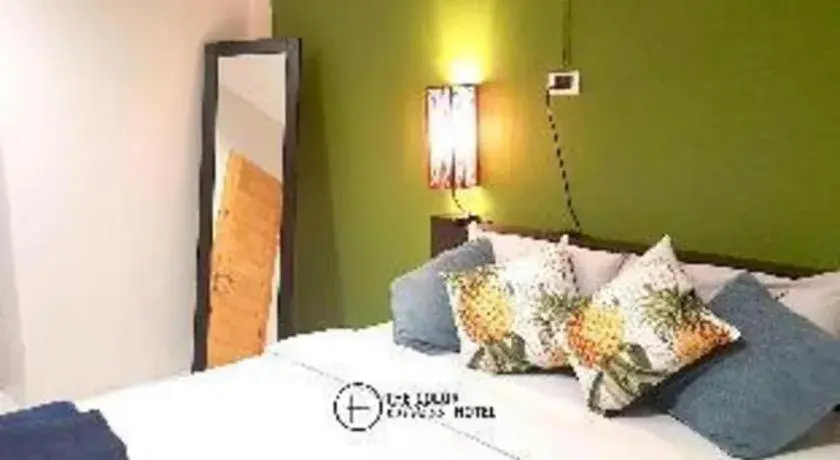 Bed in The Color Express Hotel Bed in The Color Express Hotel