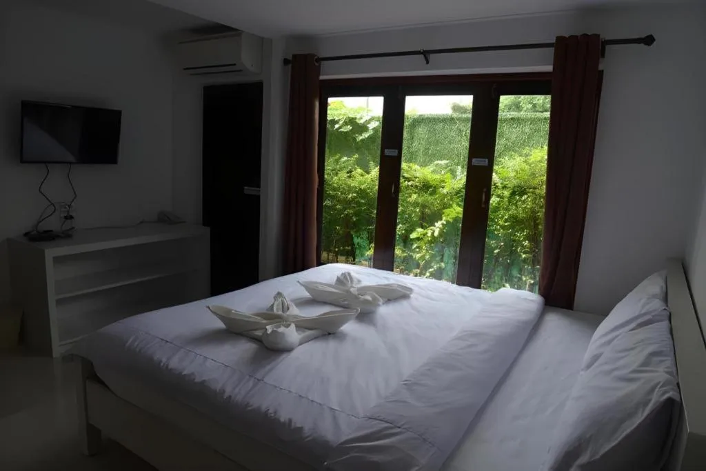 Bed in Sucholtee Resort