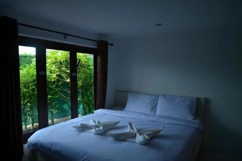 Bed in Sucholtee Resort