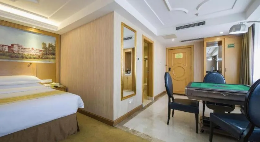 Bed in Vienna Hotel Guangzhou Panyu Shiqiao Center Branch