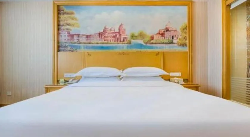 Bed in Vienna Hotel Guangzhou Panyu Shiqiao Center Branch