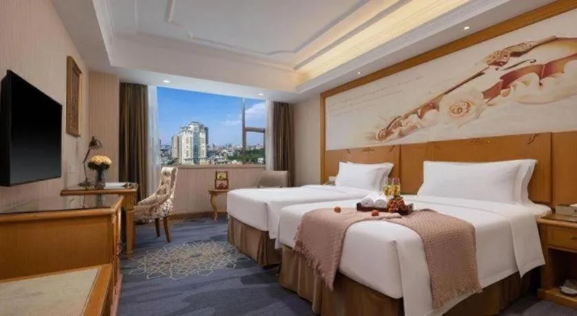 Bed in Vienna Hotel Guangzhou Panyu Shiqiao Center Branch