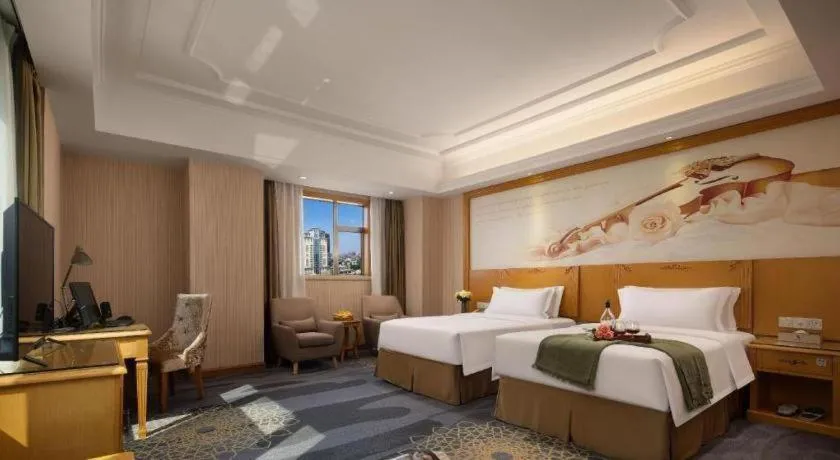 Bed in Vienna Hotel Guangzhou Panyu Shiqiao Center Branch