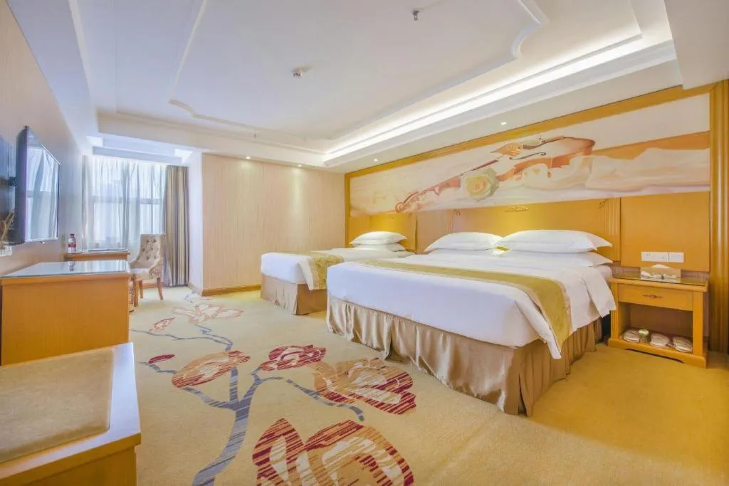 Bed in Vienna Hotel Guangzhou Panyu Shiqiao Center Branch