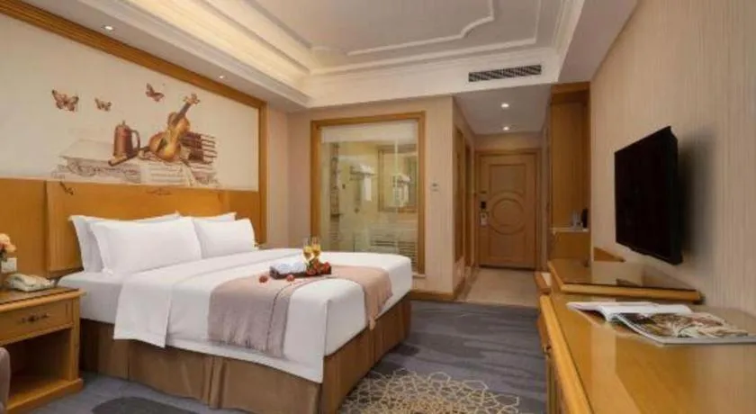Bed in Vienna Hotel Guangzhou Panyu Shiqiao Center Branch