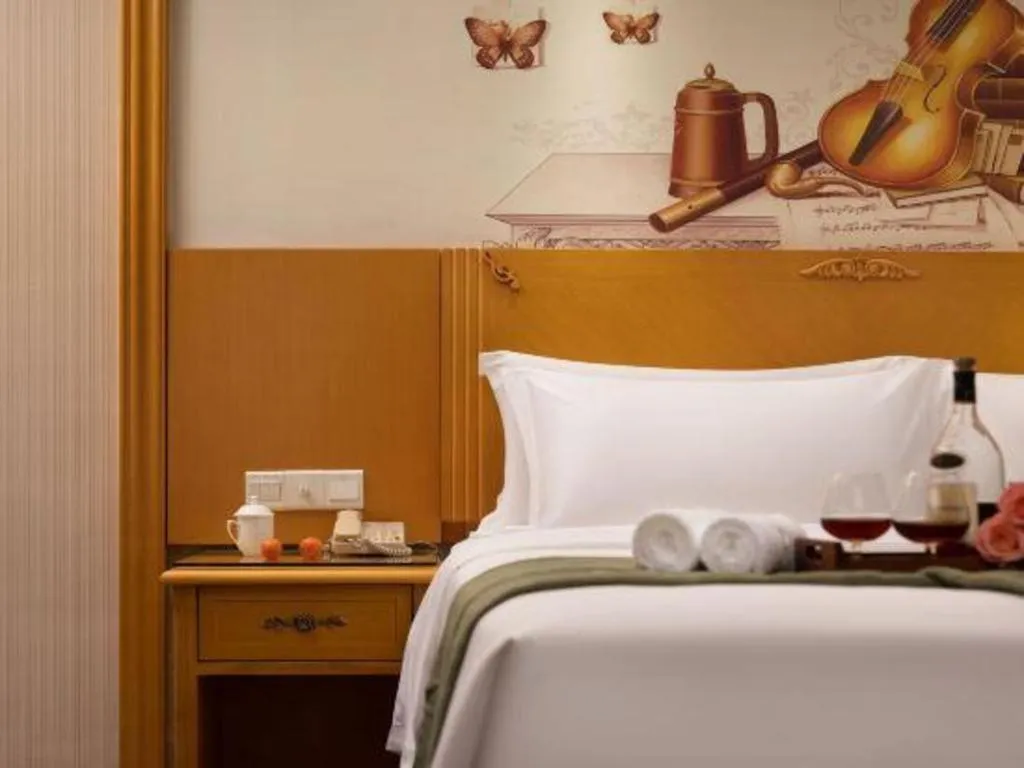 Bed in Vienna Hotel Guangzhou Panyu Shiqiao Center Branch