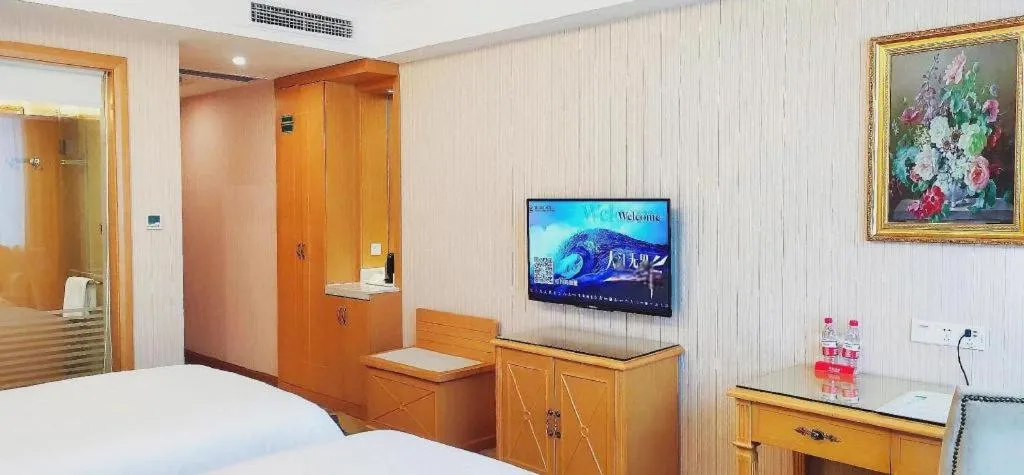 Bed in Vienna Hotel Guangzhou Panyu Shiqiao Center Branch