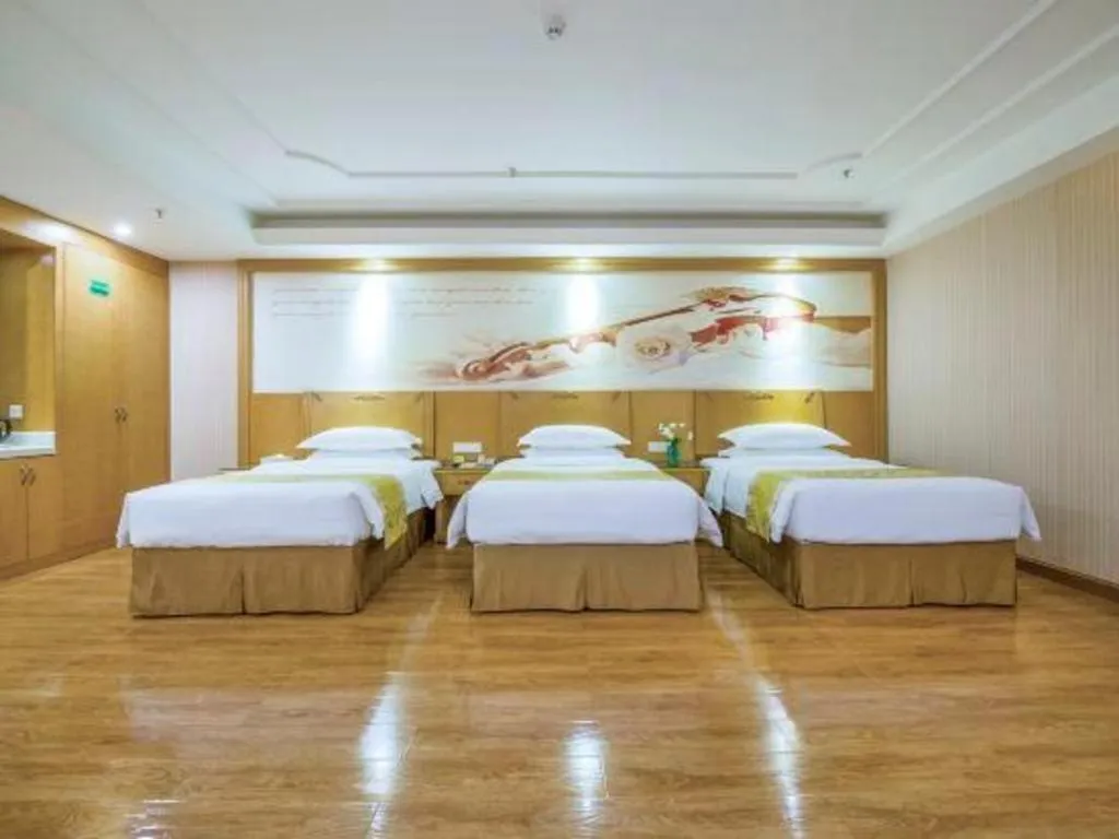 Bed in Vienna Hotel Guangzhou Panyu Shiqiao Center Branch