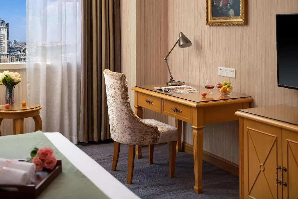 Bed in Vienna Hotel Guangzhou Panyu Shiqiao Center Branch