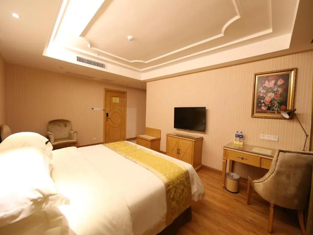 Bed in Vienna Hotel Guangzhou Panyu Shiqiao Center Branch
